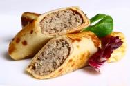 Baked pancakes with meat Pancakes with minced meat baked in the oven